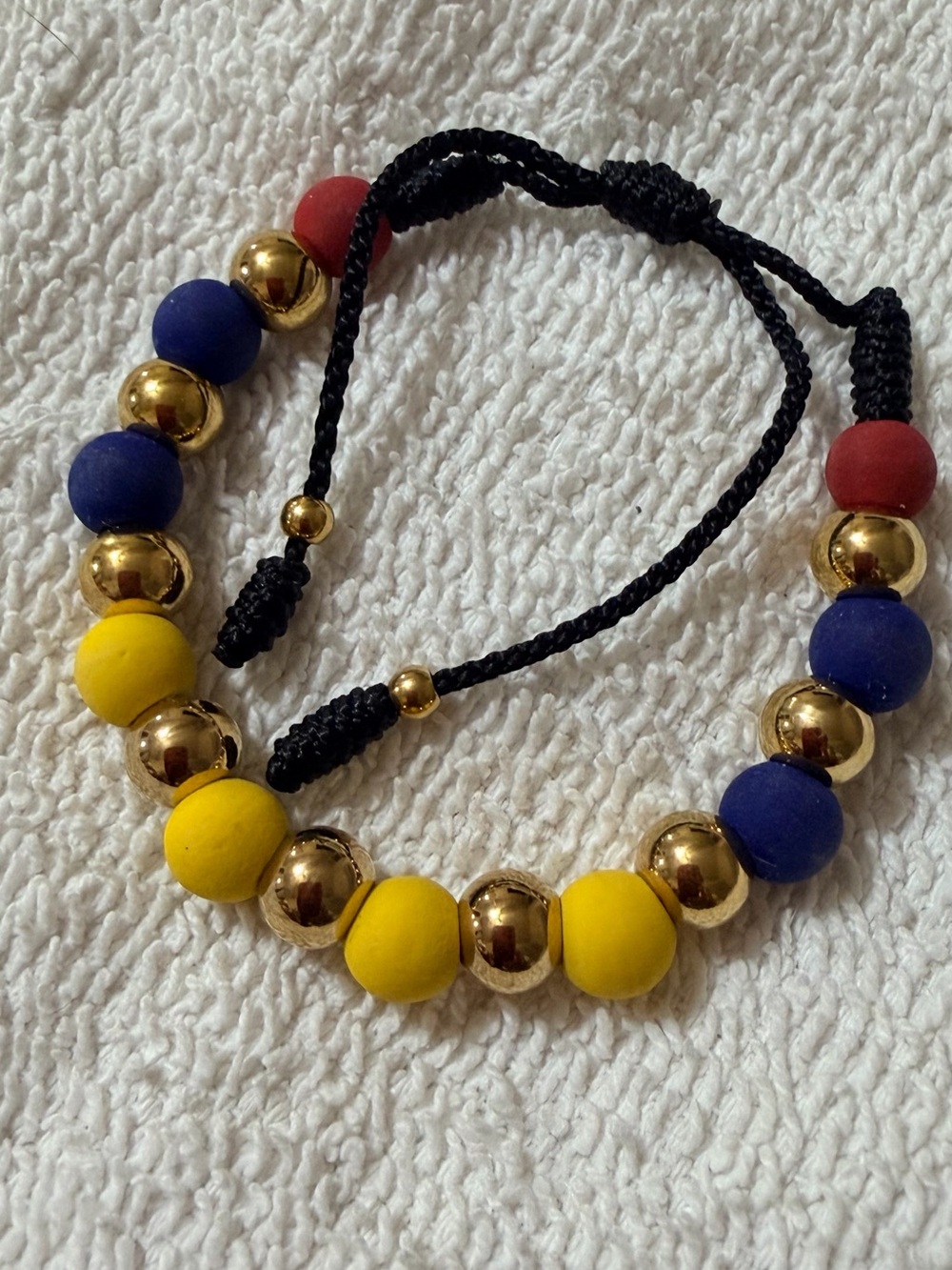 Adjustable Beaded neoprene Bracelet with Yellow, Blue, Red & Gold Accents